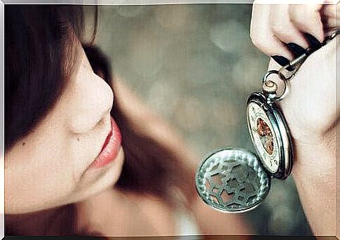 woman looking at watch