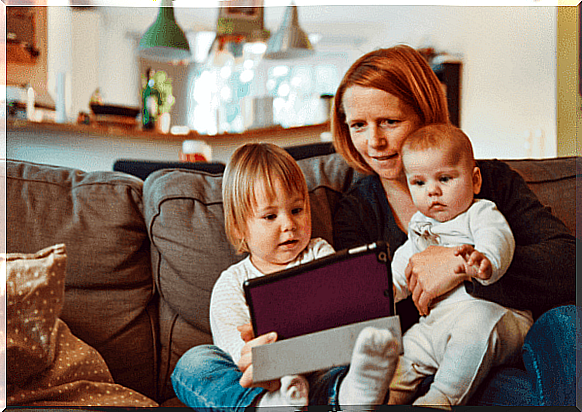 Mother reads to children