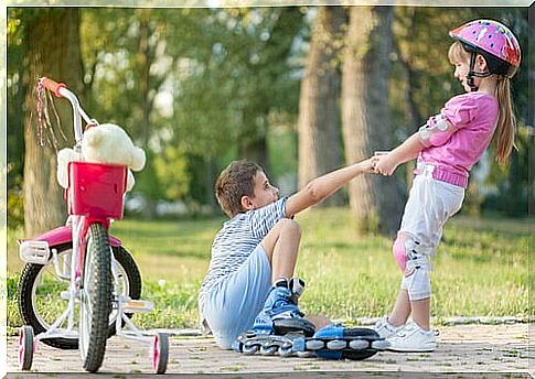 A boy pulling a girl