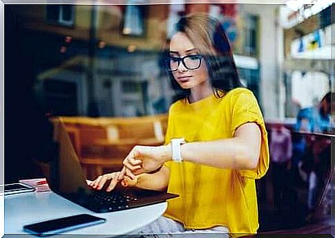 Woman looking at watch