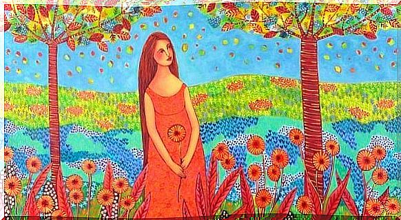 Woman in flower meadow