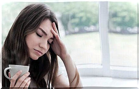 A woman drinking tea.