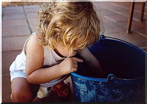 Children play with bucket