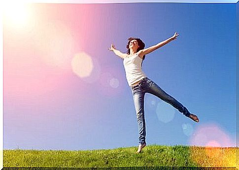 Woman who feels happiness and pleasure in the sun.