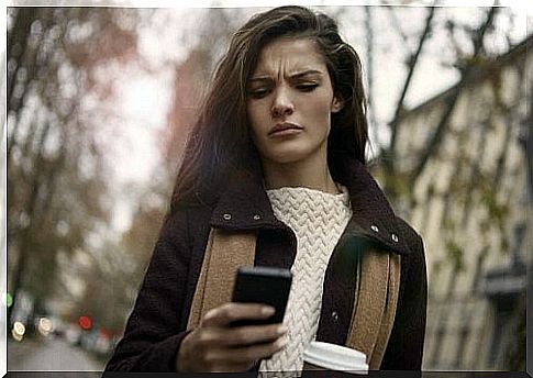 Girl looking at cell phone.