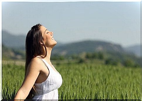 Woman smiling.