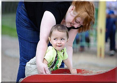 Mother and child playing.