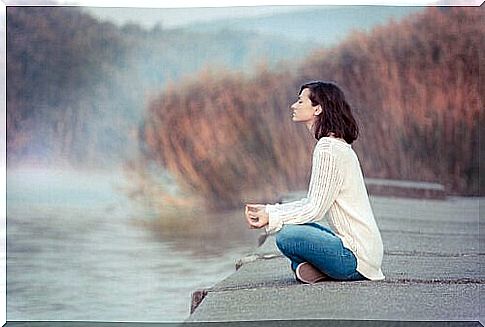 A woman who practices mindfulness for the unemployed.