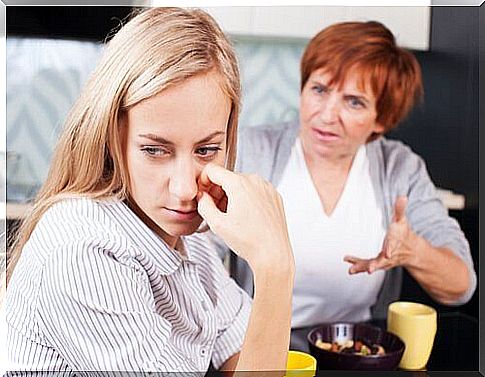 A mother scolds her daughter.