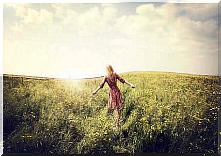 A woman in a field.